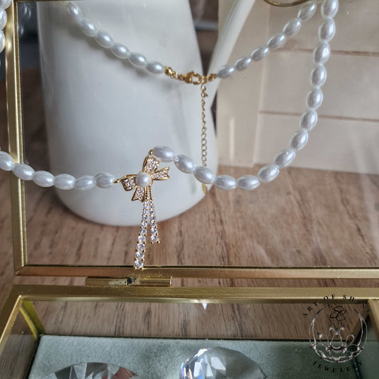 Perls with Bow Art of Shine